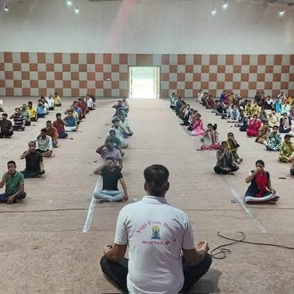 An indoor group yoga session